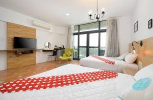 Uma cama ou camas num quarto em 康逸旅宿Comeinn2