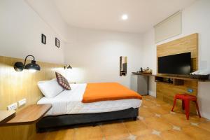 Uma cama ou camas num quarto em 康逸旅宿Comeinn2
