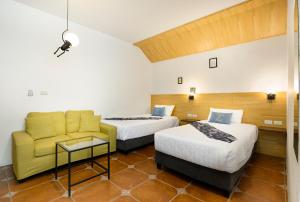 Uma cama ou camas num quarto em 康逸旅宿Comeinn2