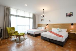 Postel nebo postele na pokoji v ubytování 康逸旅宿Comeinn2