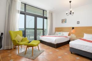 Uma cama ou camas num quarto em 康逸旅宿Comeinn2