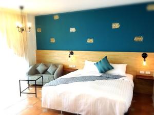 Uma cama ou camas num quarto em 康逸旅宿Comeinn2