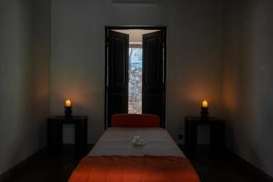 Letto o letti in una camera di Wallawwa