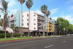 a building on a street with palm trees at Playa Vista 2br w gym pool nr beach LAX LAX-1085 in Los Angeles