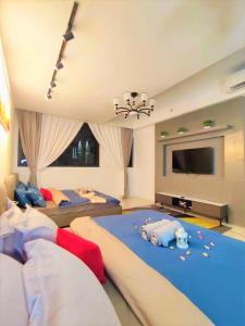 מיטה או מיטות בחדר ב-Chambers WTC Warmth Suites Kuala Lumpur by Warm Home