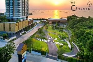 an aerial view of the ayayan the parkgate garden at sunset at Yuu Residence in Si Racha