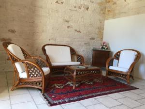 Posezení v ubytování Relais Masseria Serritella