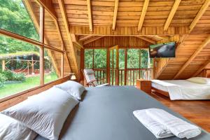 Postel nebo postele na pokoji v ubytování La Providencia Lodge