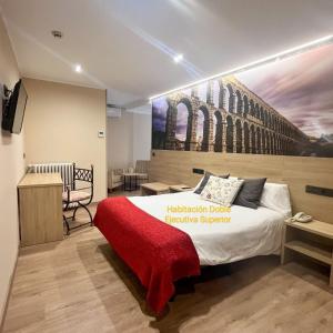 Postel nebo postele na pokoji v ubytování Hotel Venta Magullo