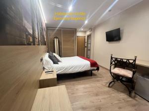 TV a/nebo společenská místnost v ubytování Hotel Venta Magullo