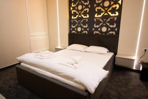 Ένα ή περισσότερα κρεβάτια σε δωμάτιο στο HOTEL GLAMOUR IMPERIAL +25 φωτογραφίες