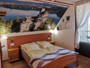 Posteľ alebo postele v izbe v ubytovaní Arenda Noclegi Niedzica