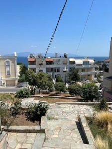 a view of a city with a building at Elaia Apartment in Kavala