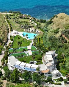 an aerial view of a resort with a swimming pool at Infinity Resort Tropea in Parghelia
