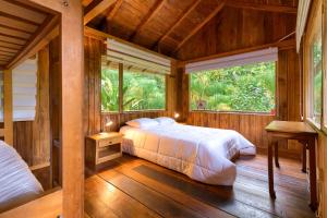 Postel nebo postele na pokoji v ubytování La Providencia Lodge