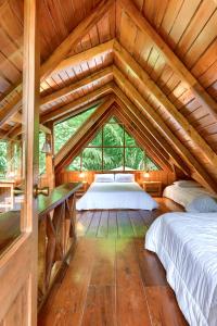 Postel nebo postele na pokoji v ubytování La Providencia Lodge