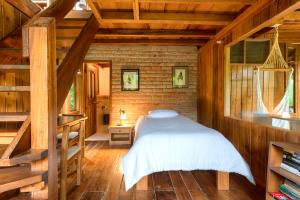 Postel nebo postele na pokoji v ubytování La Providencia Lodge