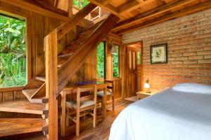 Postel nebo postele na pokoji v ubytování La Providencia Lodge