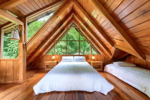 Postel nebo postele na pokoji v ubytování La Providencia Lodge