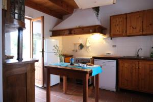 Køkken eller tekøkken på Casa Bianchi - Villa immersa nel verde