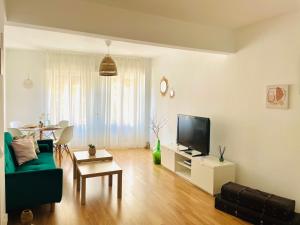 Televizors / izklaižu centrs naktsmītnē Apartamento Marcajada