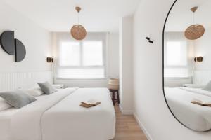 Posteľ alebo postele v izbe v ubytovaní Port Forum Apartments by Olala Homes