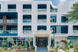 an exterior view of the meridian resort building at Sugar Marina Hotel - NAUTICAL - Kata Beach - SHA plus in Kata Beach