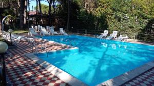 Bazén v ubytování G/Hotel Lignano nebo v jeho okolí