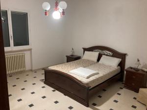 En eller flere senger på et rom på Casa vacanza IL MELOGRANO Giuggianello (Lecce)