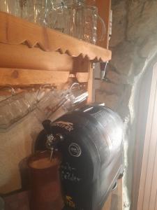 a camera sitting on a counter in a kitchen at Home&Classic - Alte Werkstatt in Effelder +24 photos
