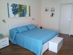 A bed or beds in a room at Residenza Piazza Moro