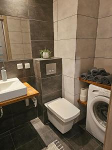 Kúpeľňa v ubytovaní Apartament Rodzinny - całodobowe zakwaterowanie, bezpłatny parking