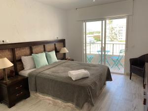 Postel nebo postele na pokoji v ubytování Villajoyosa Sweet