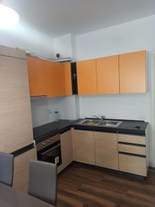 Kuchyň nebo kuchyňský kout v ubytování Lovely new apartment near the historic center.