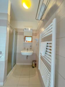 Koupelna v ubytování Slunečný Penzion