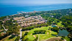 an aerial view of a resort by the water at CABOPINO, Las Mimosas in Marbella