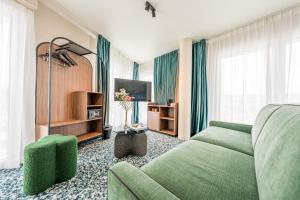 Un lugar para sentarse en Hotel D Bulle - La Gruyère