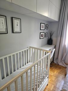 Posteľ alebo postele v izbe v ubytovaní Apartament Rodzinny - całodobowe zakwaterowanie, bezpłatny parking