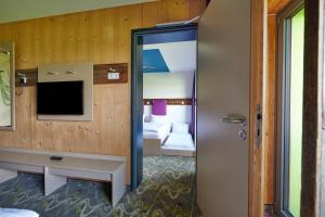 TV a/nebo společenská místnost v ubytování Explorer Hotel Bad Kleinkirchheim