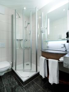 Koupelna v ubytování Romantik Hotel Barbarossa + 37 fotografií