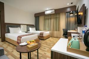 Voodi või voodid majutusasutuse Hotel Starlight toas