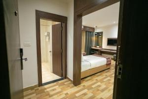 Voodi või voodid majutusasutuse Hotel Starlight toas