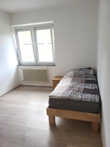Posteľ alebo postele v izbe v ubytovaní Schöne 2 zwei Zimmer Wohnung