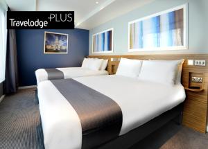 Postel nebo postele na pokoji v ubytování Travelodge Plus Galway