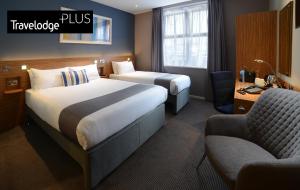 Postel nebo postele na pokoji v ubytování Travelodge Plus Galway
