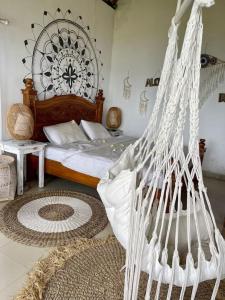 Tempat tidur dalam kamar di Makawi Tuwa