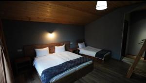 Llit o llits en una habitació de Kazbegi 4U