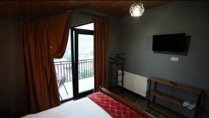 Llit o llits en una habitació de Kazbegi 4U