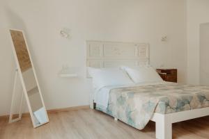 Postel nebo postele na pokoji v ubytování La Torre Vasto B&B