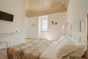 Postel nebo postele na pokoji v ubytování La Torre Vasto B&B
